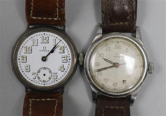 Two gentlemans 1920s/1930s Omega manual wind wrist watches, one with silver case.